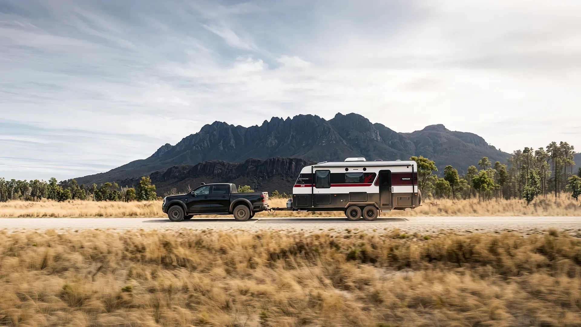 Terrain Tuff caravan at a remote camp at dusk